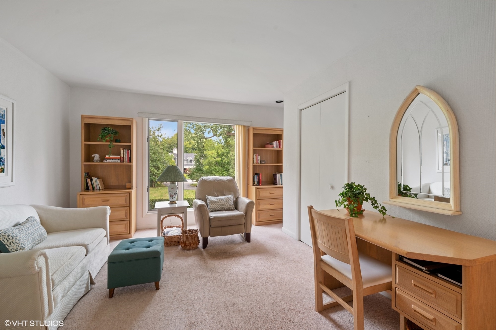 63 Overlook Drive Golf, IL 60029 - Photo 20 of 32 a living room with furniture and a large window