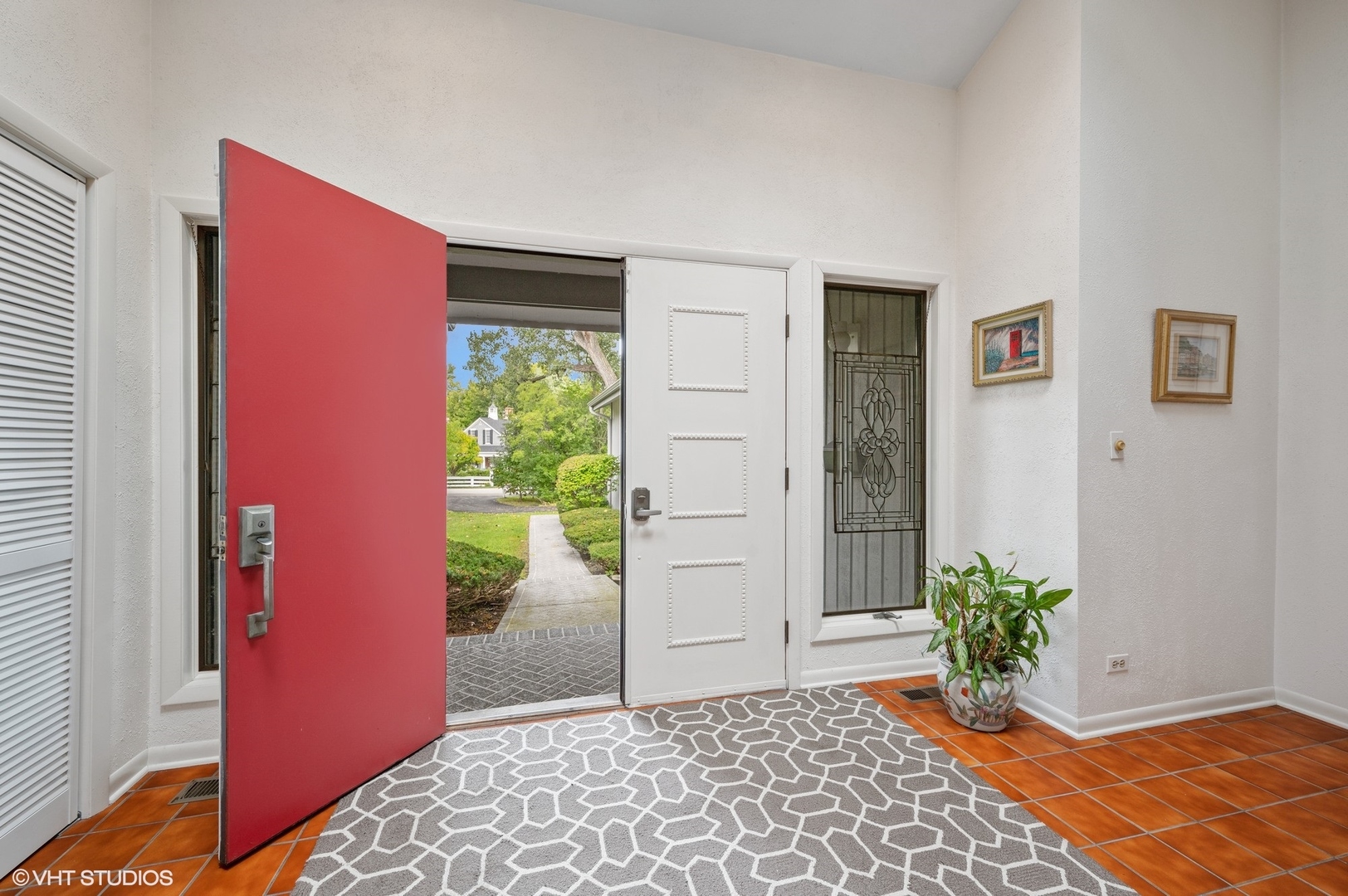 63 Overlook Drive Golf, IL 60029 - Photo 2 of 32 a room with window and a potted plant