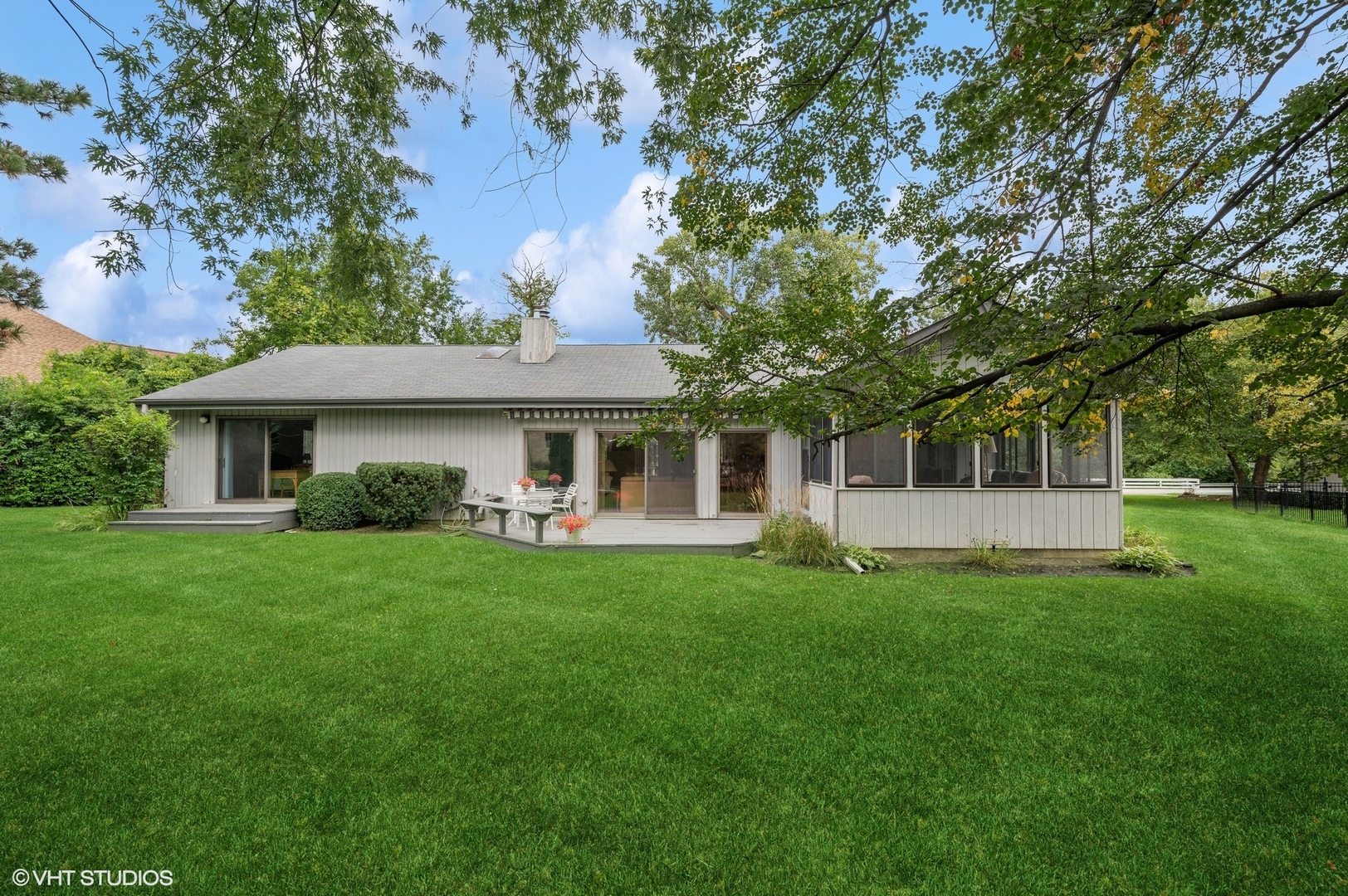 63 Overlook Drive Golf, IL 60029 - Photo 26 of 32 a front view of a house with a garden