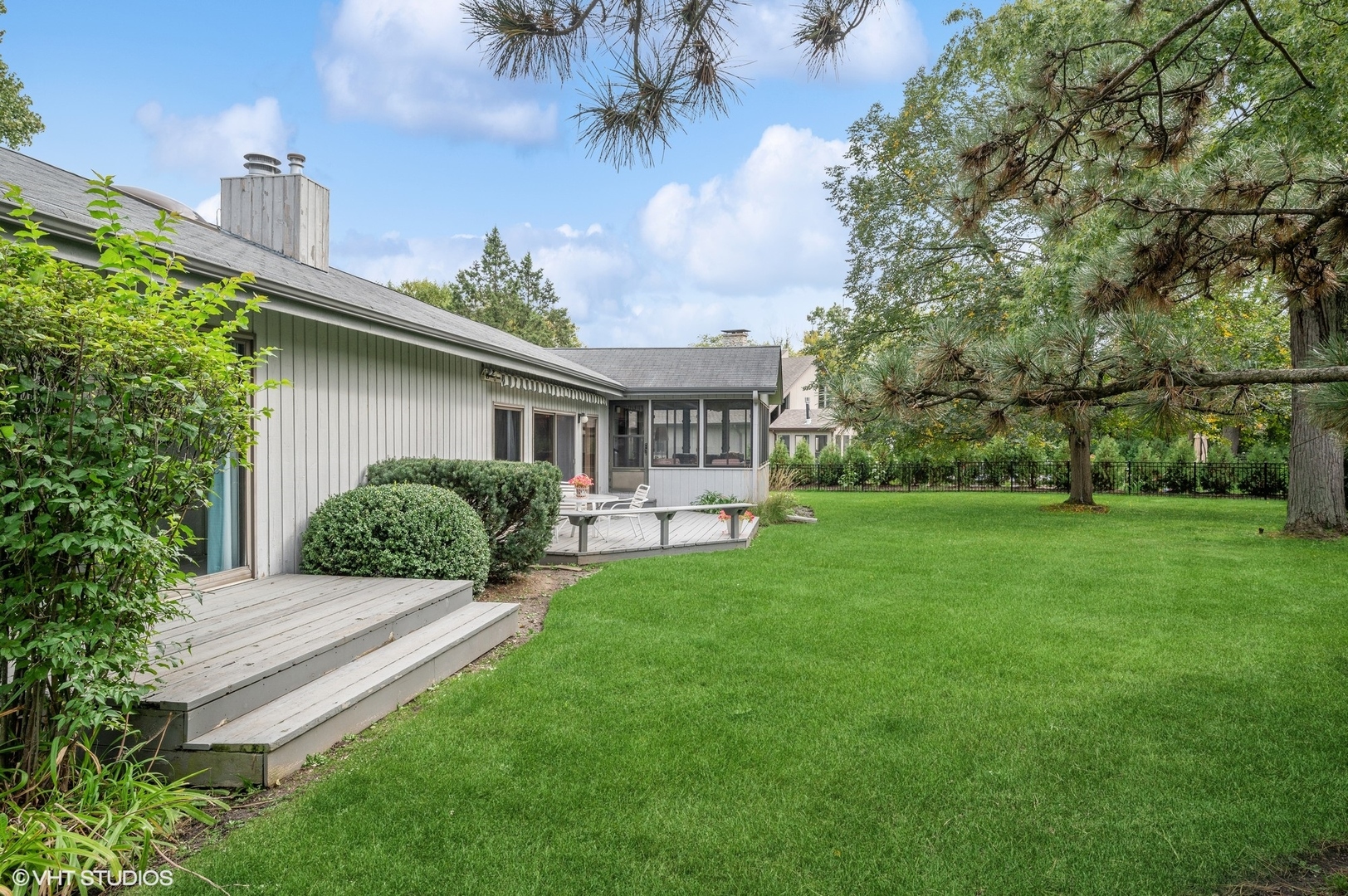 63 Overlook Drive Golf, IL 60029 - Photo 28 of 32 a view of a house with backyard and sitting area