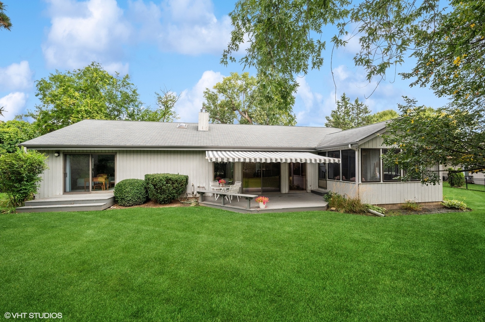 63 Overlook Drive Golf, IL 60029 - Photo 30 of 32 a view of a house with a yard and sitting area