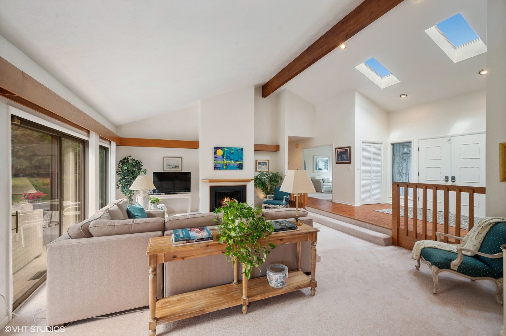 63 Overlook Drive Golf, IL 60029 - Photo 3 of 32 a living room with furniture and a fireplace