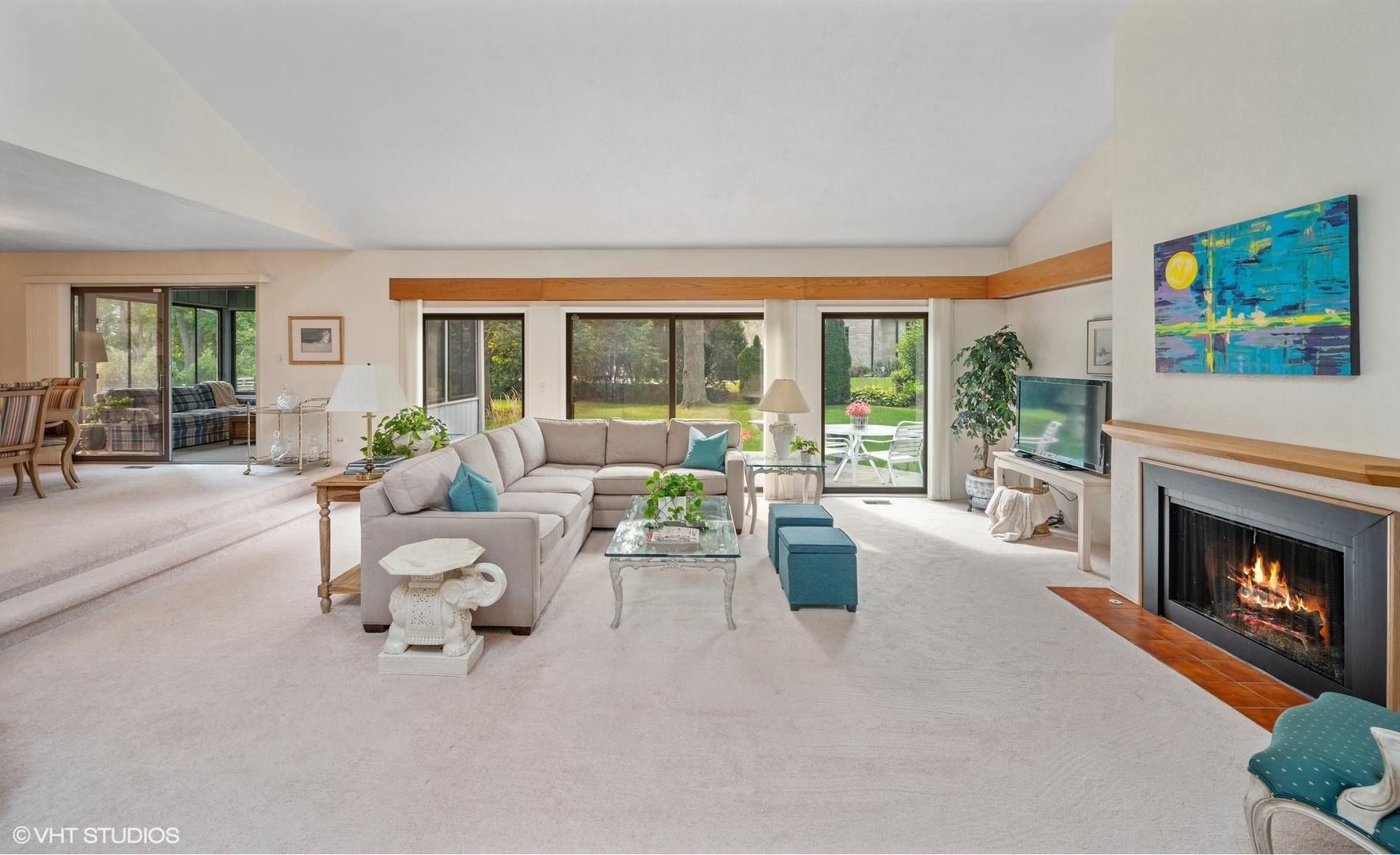 63 Overlook Drive Golf, IL 60029 - Photo 4 of 32 a living room with furniture and a fireplace