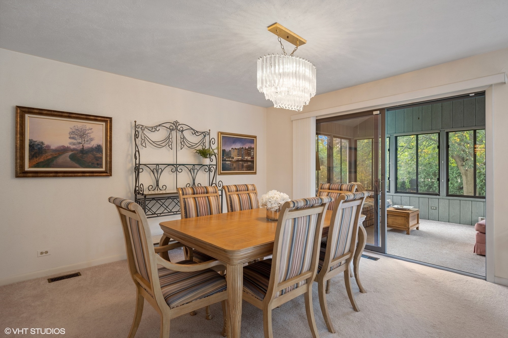 63 Overlook Drive Golf, IL 60029 - Photo 5 of 32 a view of a dining room with furniture wooden floor and chandelier