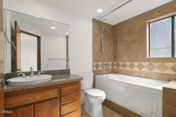 an empty room with a bathroom