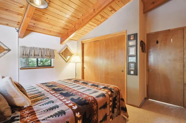 a room with furniture and a mirror