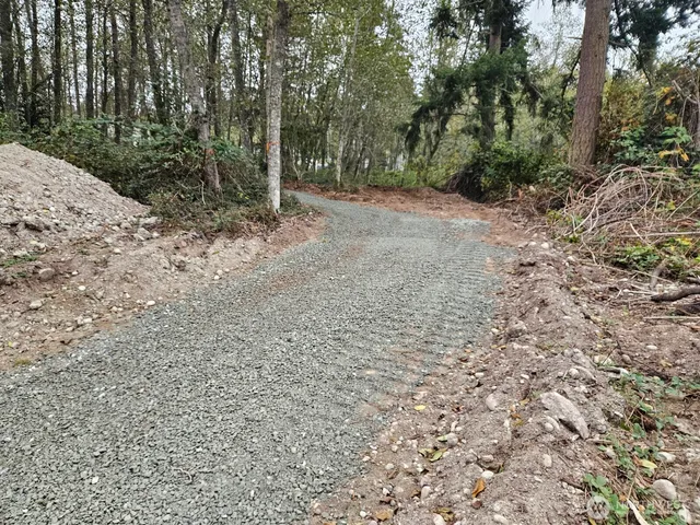 a view of a backyard of the house