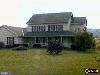 20 Balthaser Road Reading, PA 19608 - Photo 1 of 1 a front view of a house with garden