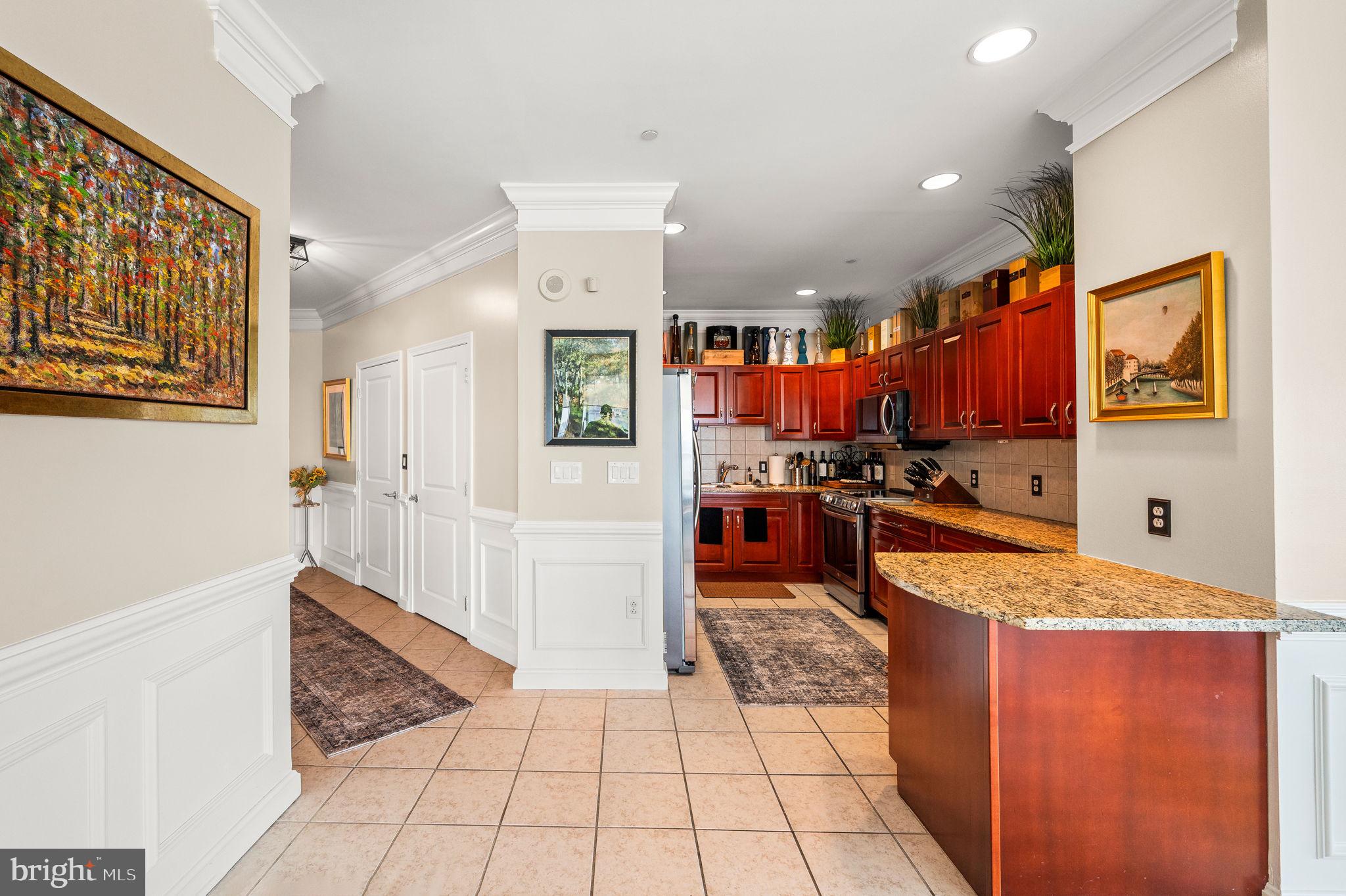 901 North Penn Street, Unit R1902 Philadelphia, PA 19123 - Photo 11 of 52 Entrance Foyer and Kitchen