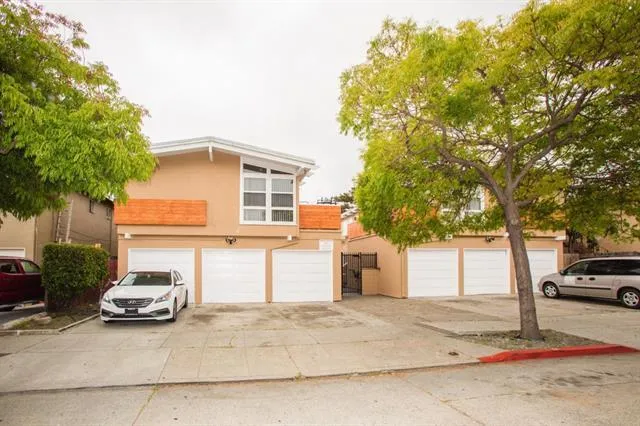 a car parked in front of a house