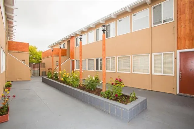 front view of a house with a small yard