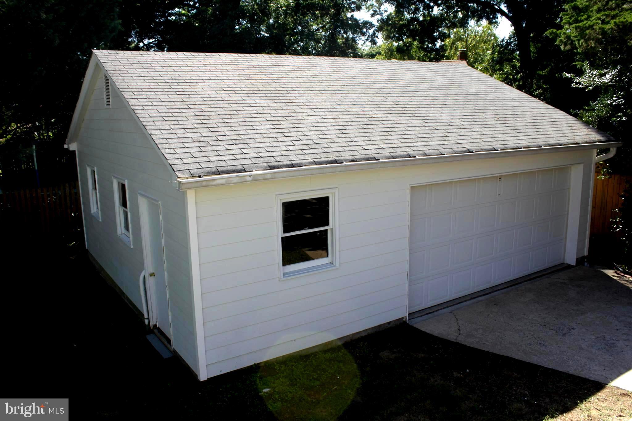 5507 Ashfield Road Alexandria, VA 22315 - Photo 34 of 41 huge 2 car garage with additional storage area