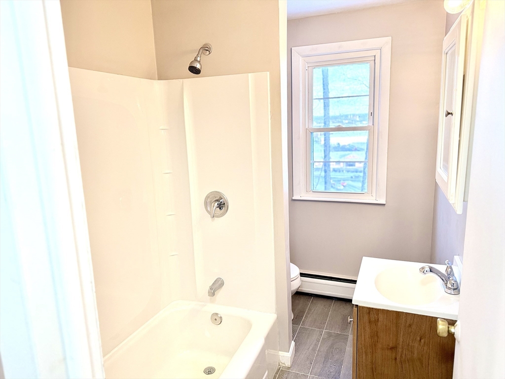 37 Plateau Circle West Springfield, MA 01089 - Photo 12 of 21 a bathroom with a bathtub and a shower