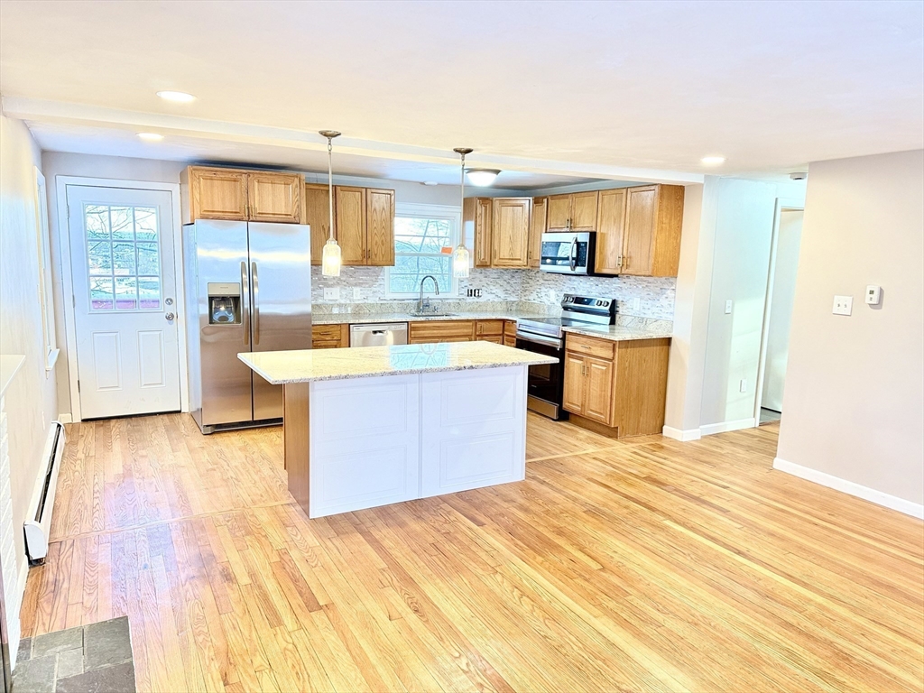 37 Plateau Circle West Springfield, MA 01089 - Photo 7 of 21 a large kitchen with stainless steel appliances granite countertop a sink and cabinets