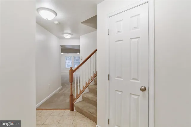 a view of a hallway with staircase
