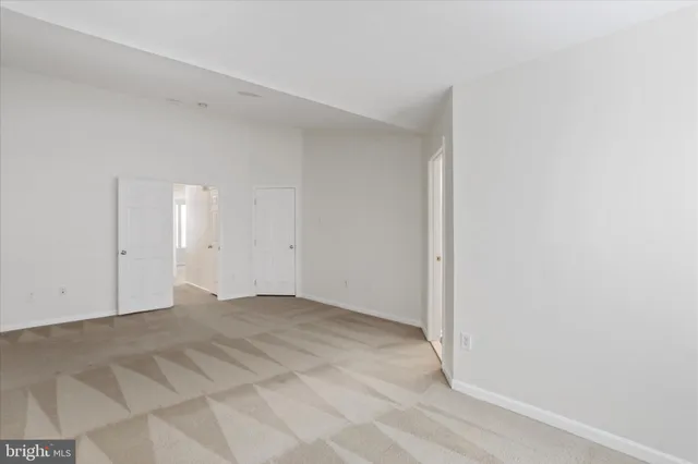 a view of a room with an empty space