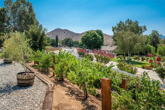 an aerial view of residential house with outdoor space and street view