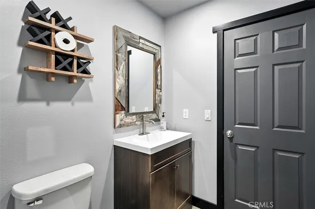 a view of backyard with swimming pool and outdoor seating