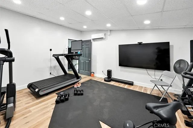 a view of a porch with furniture and garden