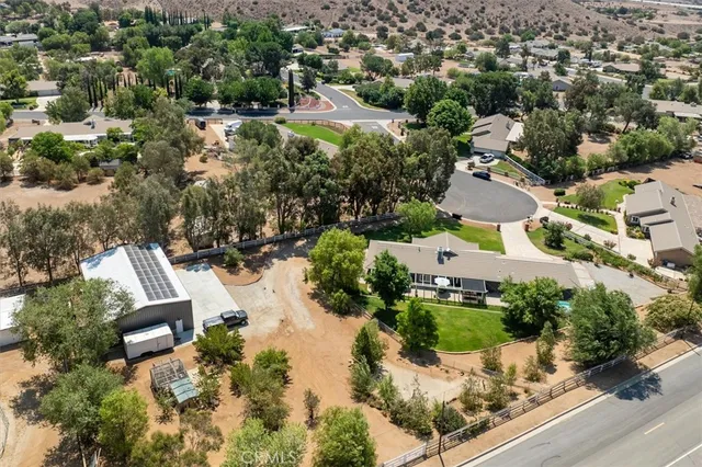 an aerial view of residential house with outdoor space