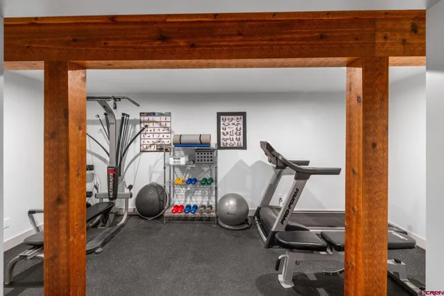 a view of a room with gym equipment