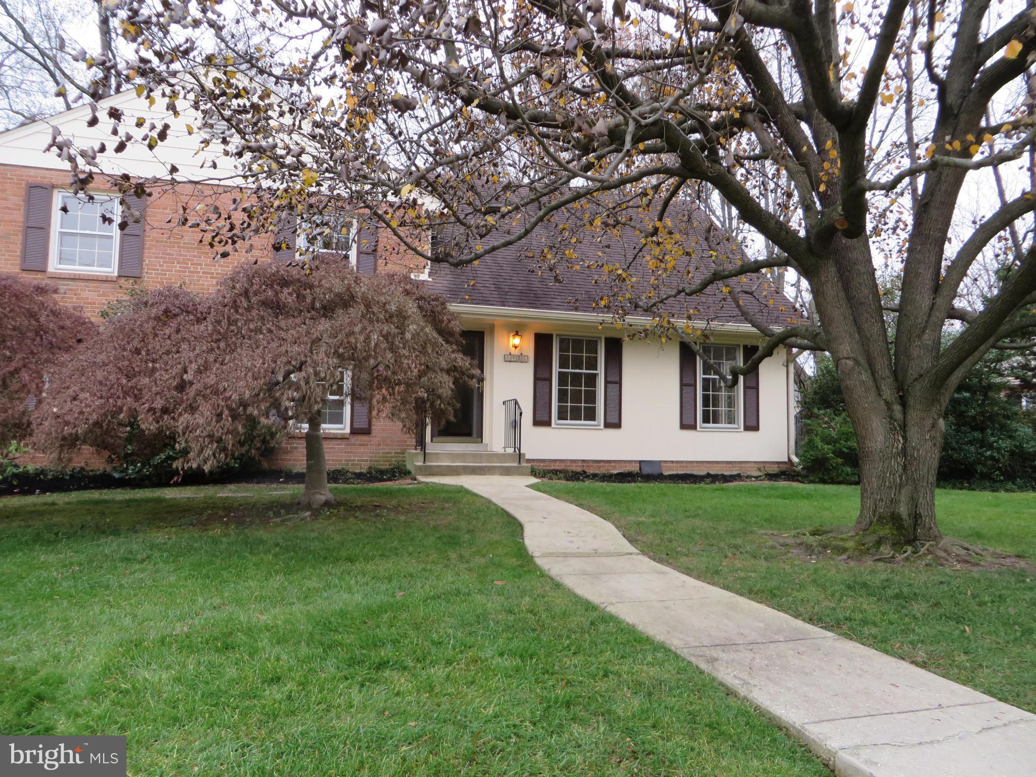 8425 Riverside Road Alexandria, VA 22308 - Photo 3 of 28 a white house that has a tree in front of it