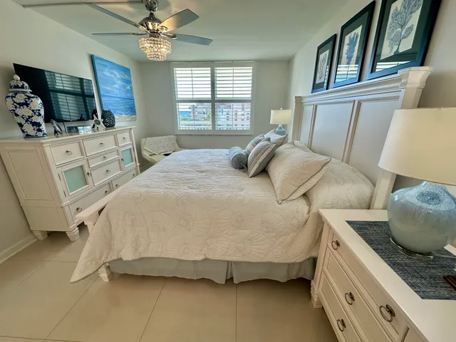 a bathroom with a double vanity sink a shower and a mirror