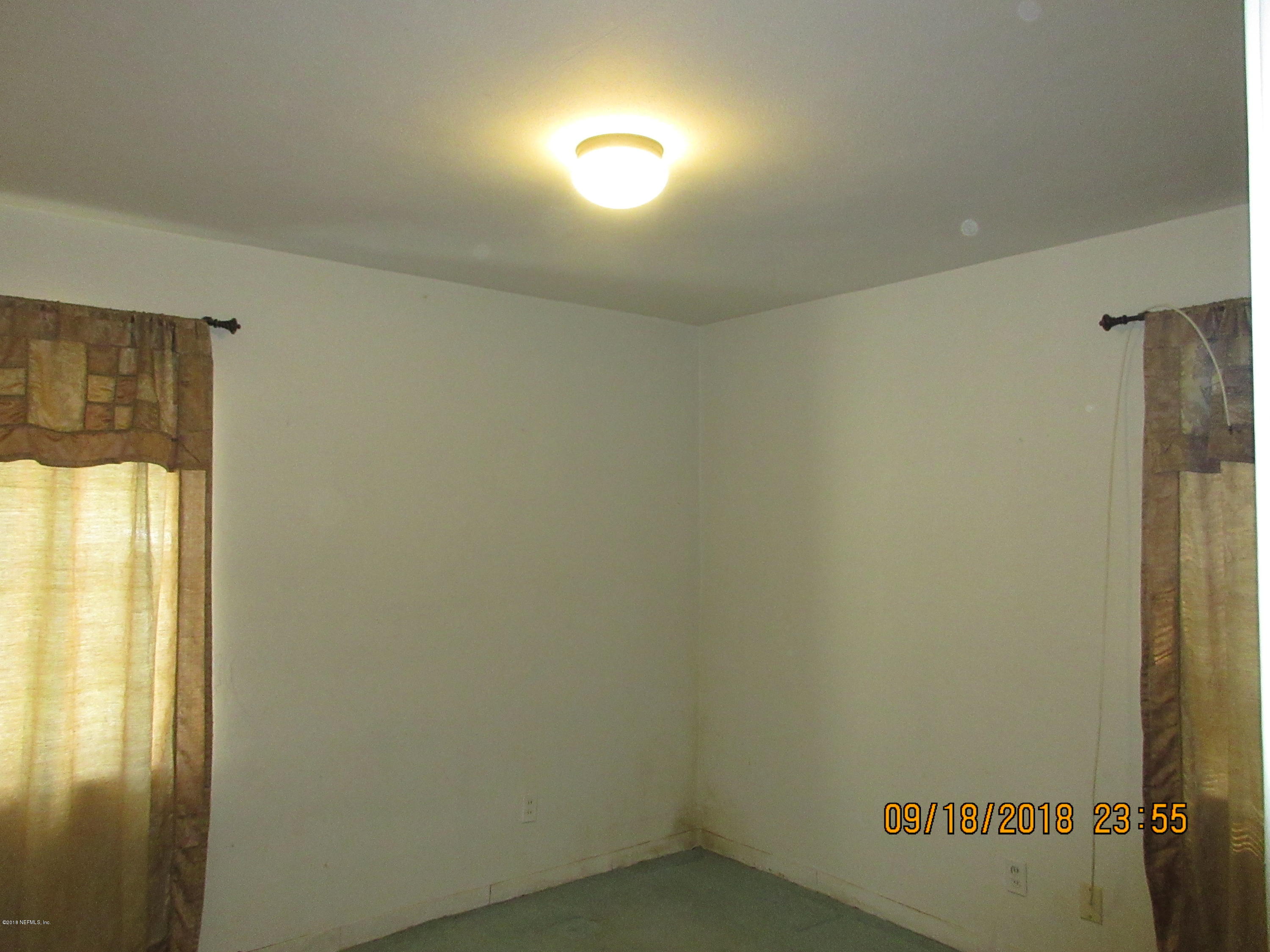 8211 Merivale Road, Unit 1A Jacksonville, FL 32208 - Photo 46 of 52 Bedroom 1
