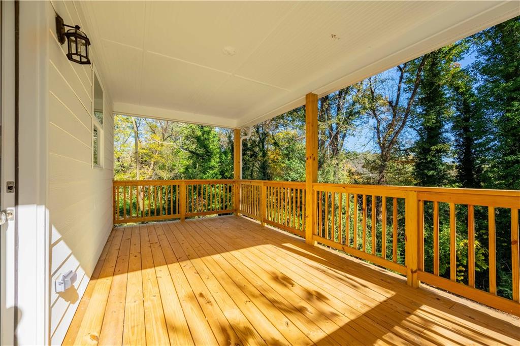 2126 Seavey Drive Decatur, GA 30032 - Photo 19 of 40 a view of balcony with wooden floor