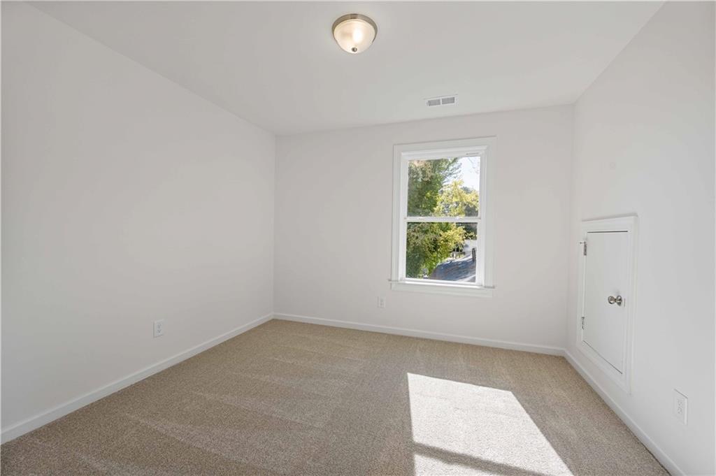 2126 Seavey Drive Decatur, GA 30032 - Photo 29 of 40 an empty room with a window