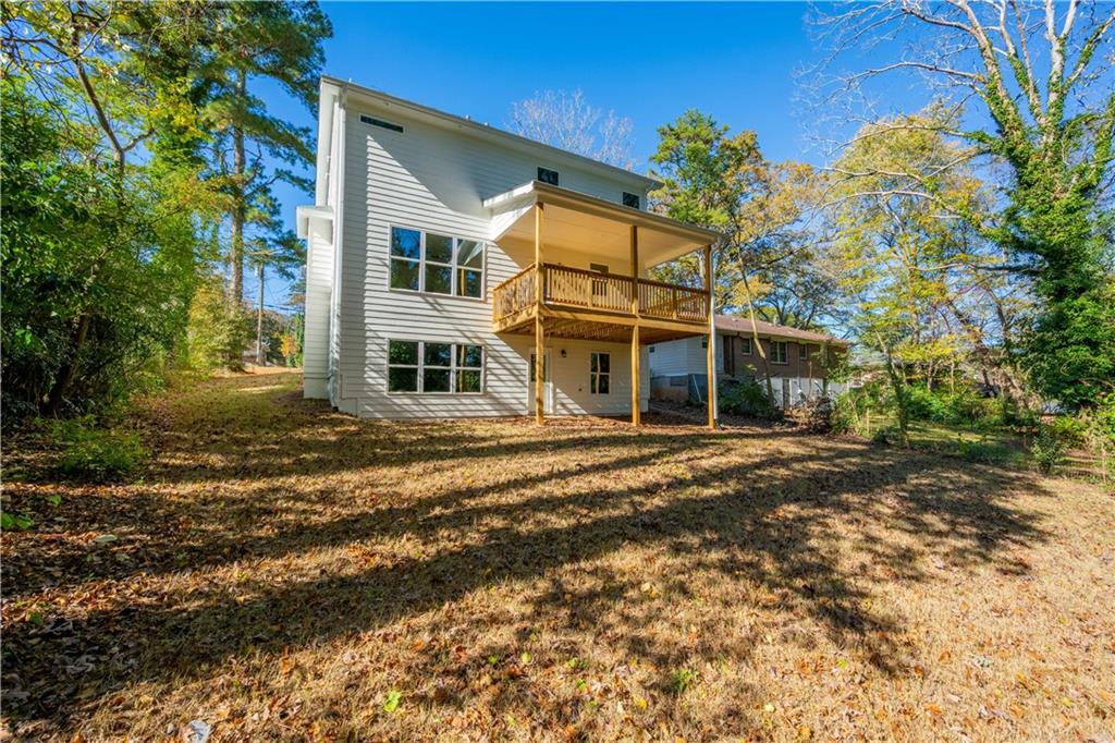 2126 Seavey Drive Decatur, GA 30032 - Photo 39 of 40 a front view of a house with a garden