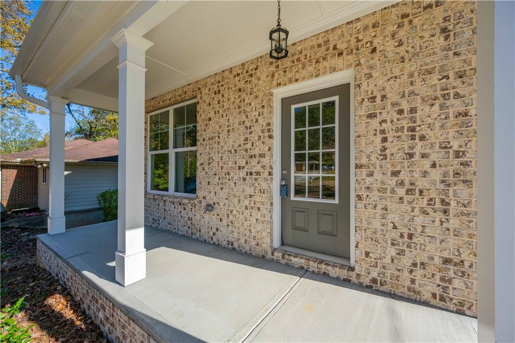 2126 Seavey Drive Decatur, GA 30032 - Photo 4 of 40 a front view of a house with a yard