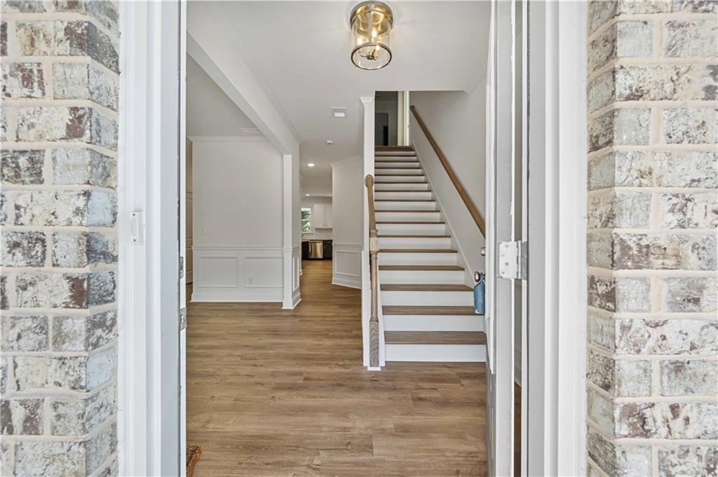 2126 Seavey Drive Decatur, GA 30032 - Photo 6 of 40 a view of entryway and hall with wooden floor
