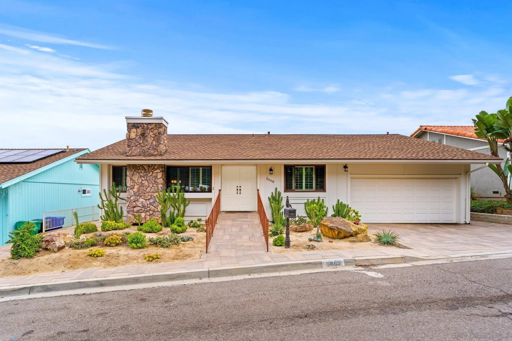 5668 Desert View Drive La Jolla, CA 92037 - Photo 1 of 23 front view of a house with a yard