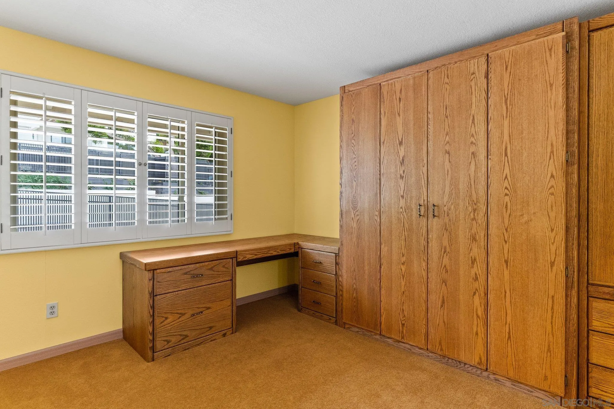 5668 Desert View Drive La Jolla, CA 92037 - Photo 15 of 23 a view of a room with large windows and furniture
