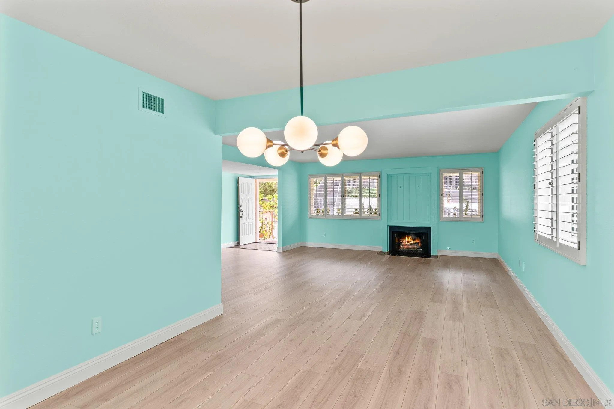 5668 Desert View Drive La Jolla, CA 92037 - Photo 5 of 23 a view of a room with window wooden floor and windows