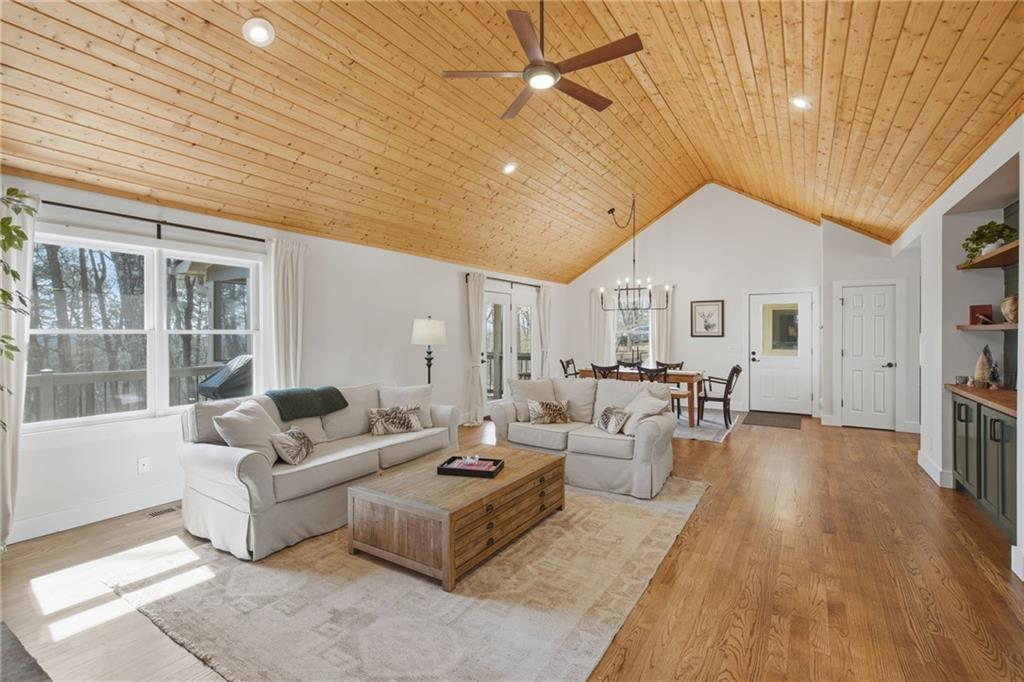 43 Morgan Walk Big Canoe, GA 30143 - Photo 12 of 66 a living room with furniture and a fireplace