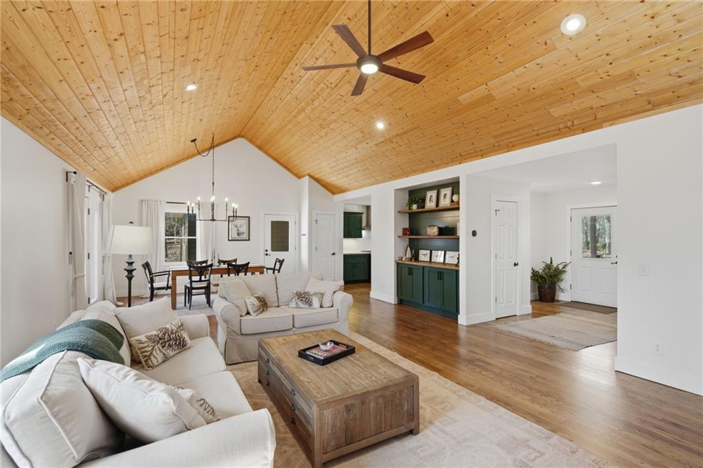 43 Morgan Walk Big Canoe, GA 30143 - Photo 13 of 66 a living room with furniture and wooden floor