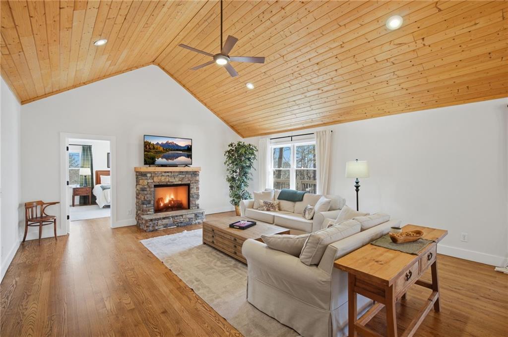43 Morgan Walk Big Canoe, GA 30143 - Photo 14 of 66 a living room with furniture and a flat screen tv