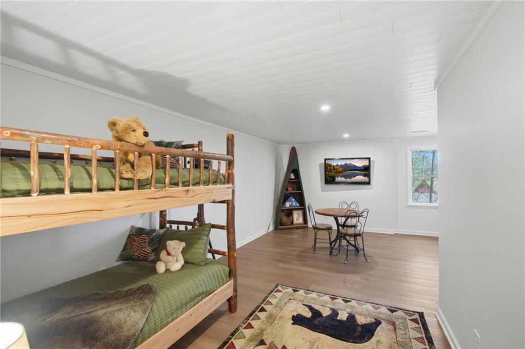 43 Morgan Walk Big Canoe, GA 30143 - Photo 32 of 66 a living room with furniture and a table