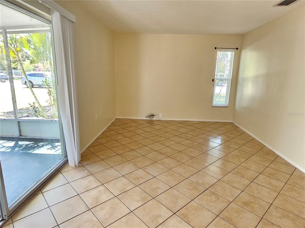105 Base Avenue East Venice, FL 34285 - Photo 16 of 31 a view of an empty room and window