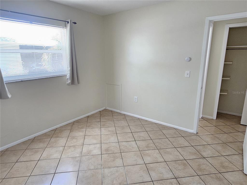 105 Base Avenue East Venice, FL 34285 - Photo 24 of 31 a view of an empty room and window