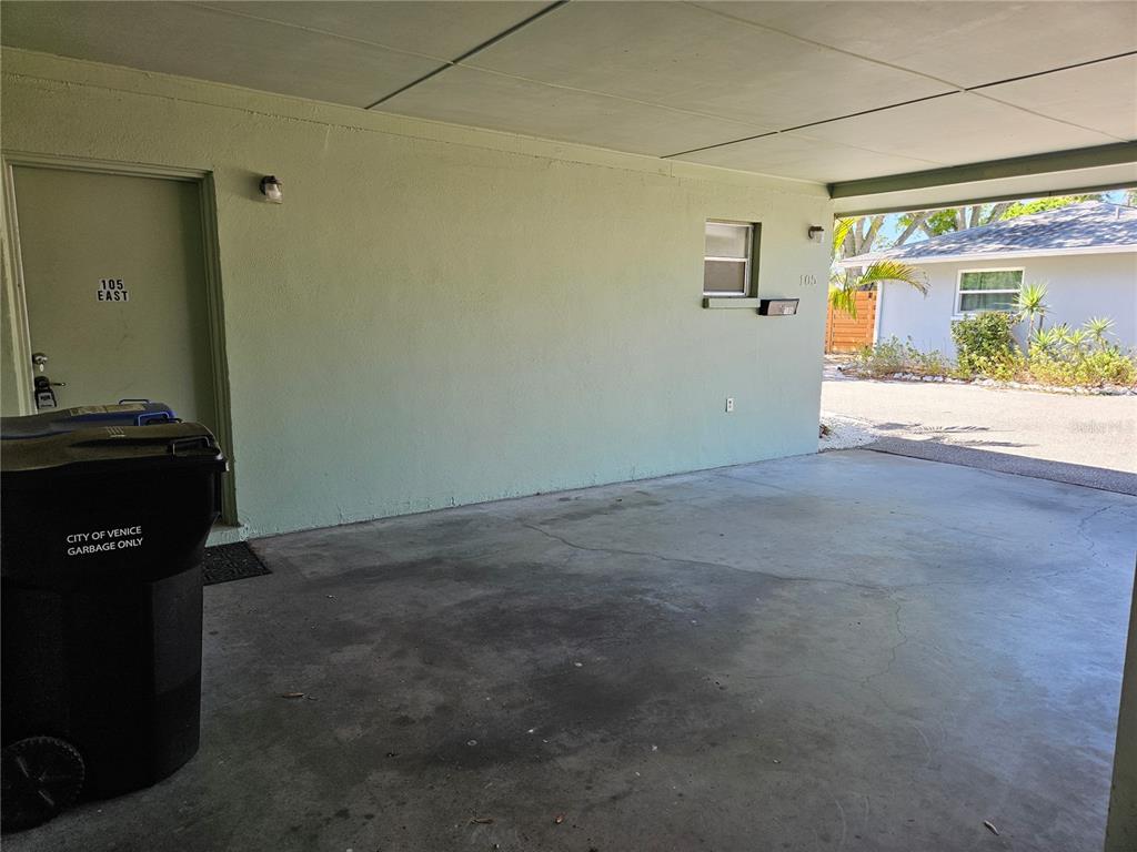 105 Base Avenue East Venice, FL 34285 - Photo 28 of 31 a view of a hallway with a window