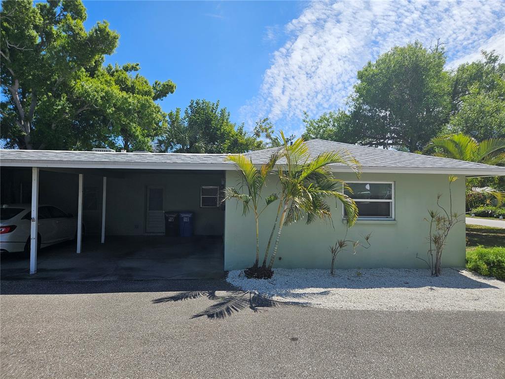 105 Base Avenue East Venice, FL 34285 - Photo 30 of 31 front view of a house with a yard