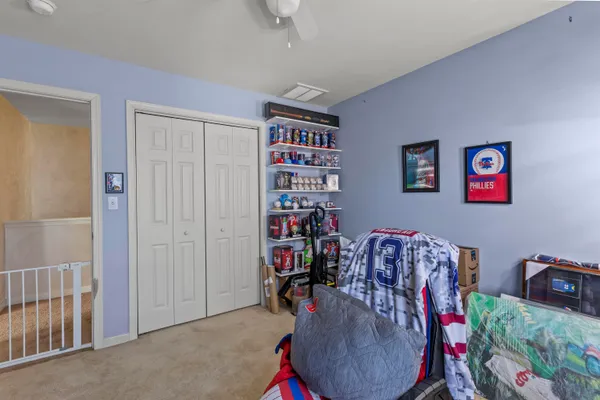 a view of a livingroom with furniture and workspace