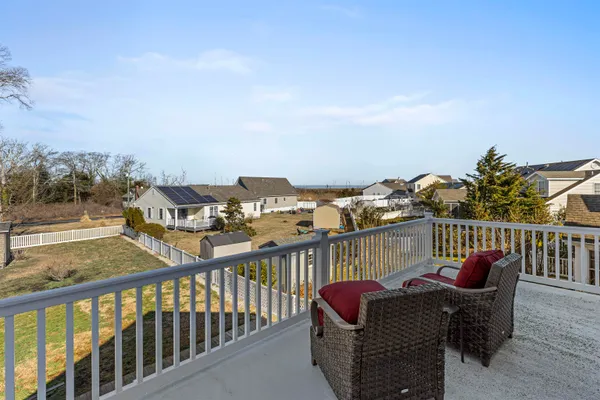 a balcony with furniture and city view