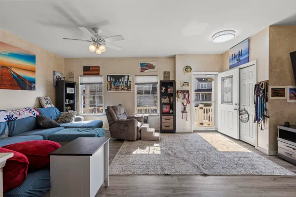 a living room with furniture and a rug