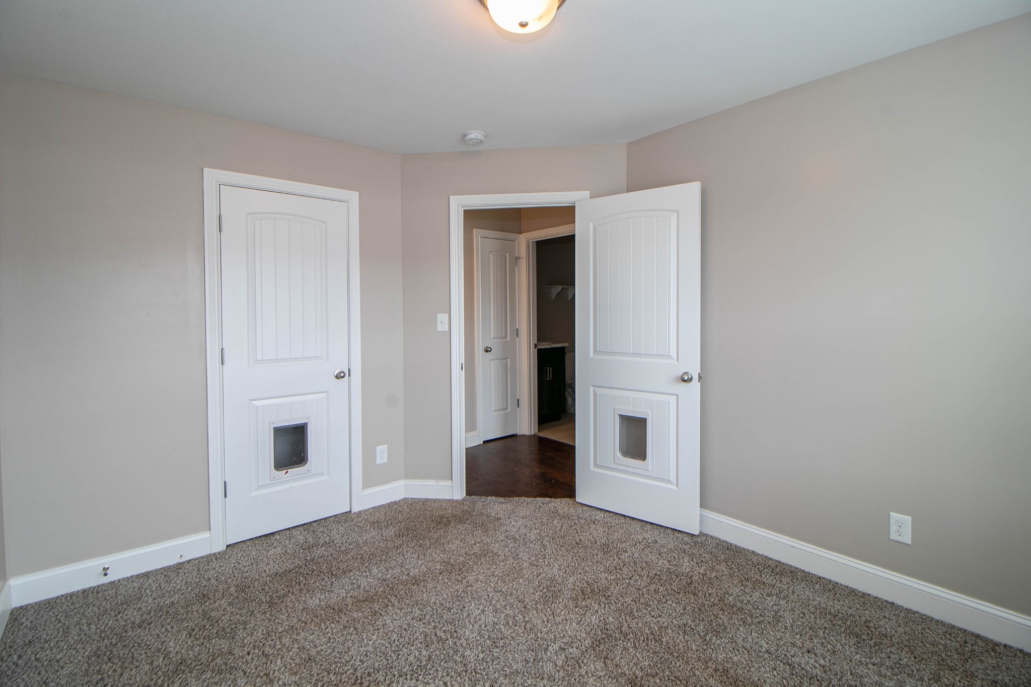 151 Ambridge Street Oak Grove, KY 42262 - Photo 20 of 30 a view of an empty room with kitchen and glass door