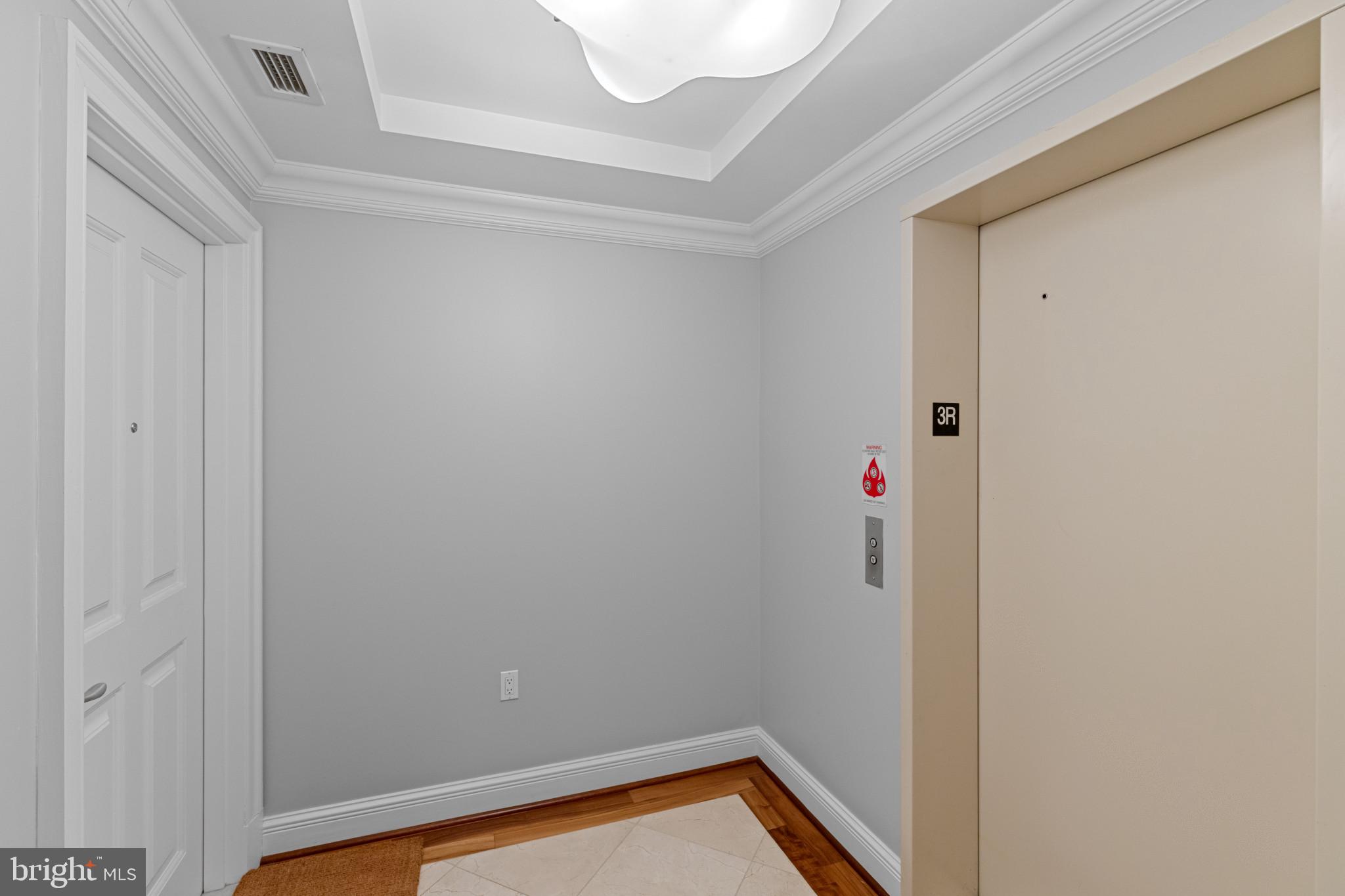 801 Key Highway, Unit 339 Baltimore, MD 21230 - Photo 2 of 44 a small space with wooden floor and a window