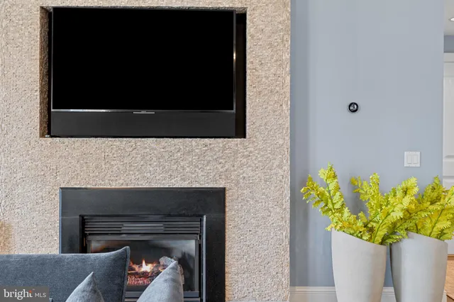 a living room with a fireplace